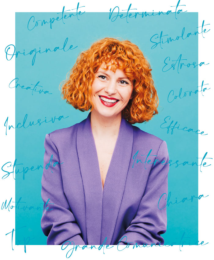 Bruna Viola smiling with her iconic red curly hair and a purple jacket surrounded by words from her feedback